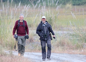 Dr Steb Fisher and Sid Francis returning from a survey